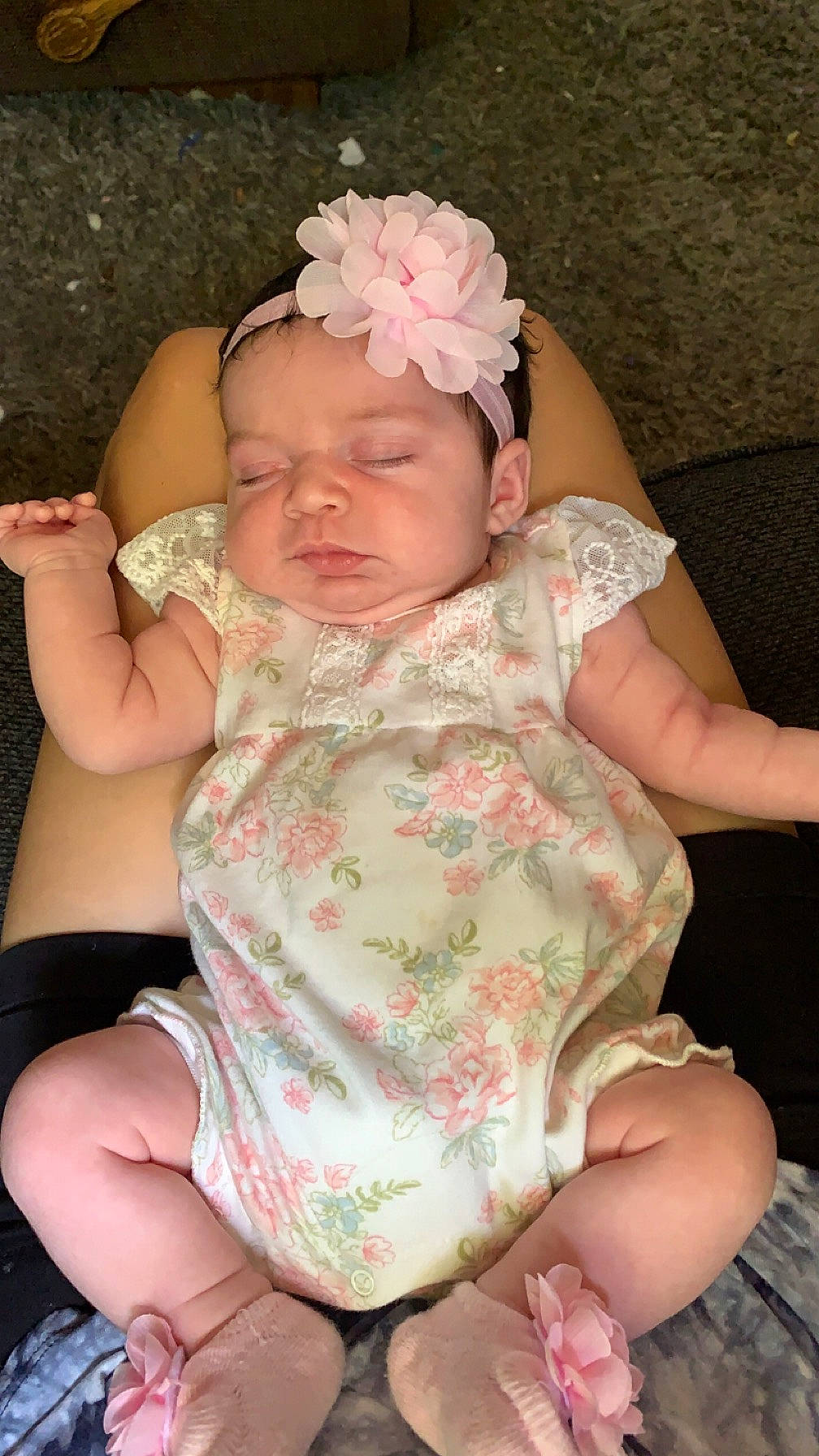 Elliana joined the competition — help win amazing prizes! baby, baby_toddler_clothing, cheek, comfort, finger, flower, grass, hand, head, headgear, headwear, human_body, iris, leg, lip, mouth, nail, person, pink, skin
