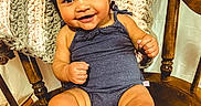 Olive joined the competition — help win amazing prizes! baby, blanket, bow, chair, child, closeup, cute, happy, headwear, indoors, infant, knitted_blanket, onesie, person, portrait, sitting, skin, smile, toddler, wooden_chair