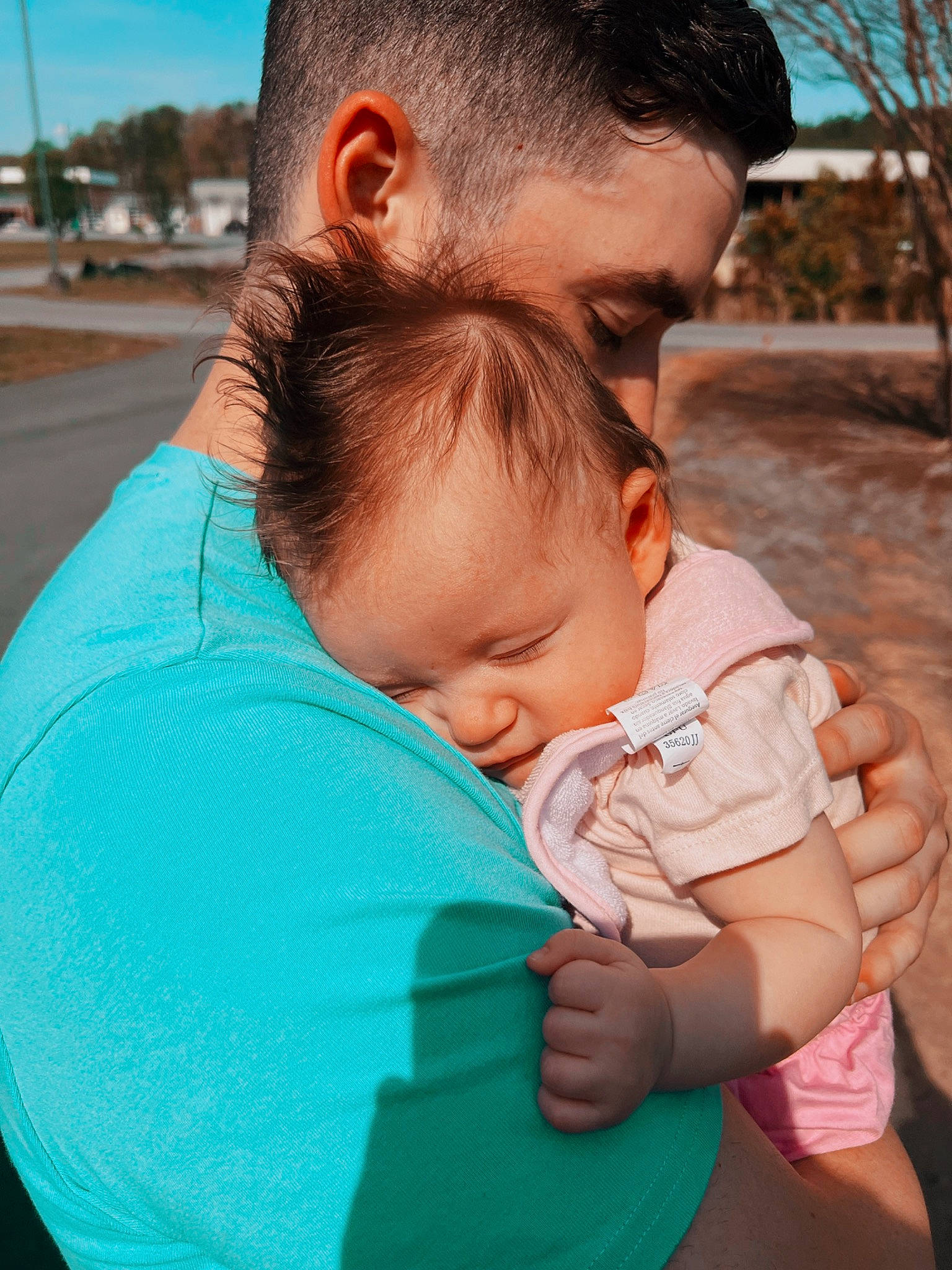 Adalyne is registered to the contest to win money with this photo: azure, baby, blue, cheek, chin, facial_expression, gesture, grass, hair, hairstyle, hand, happy, joint, neck, nose, people_in_nature, person, shoulder, skin, sky
