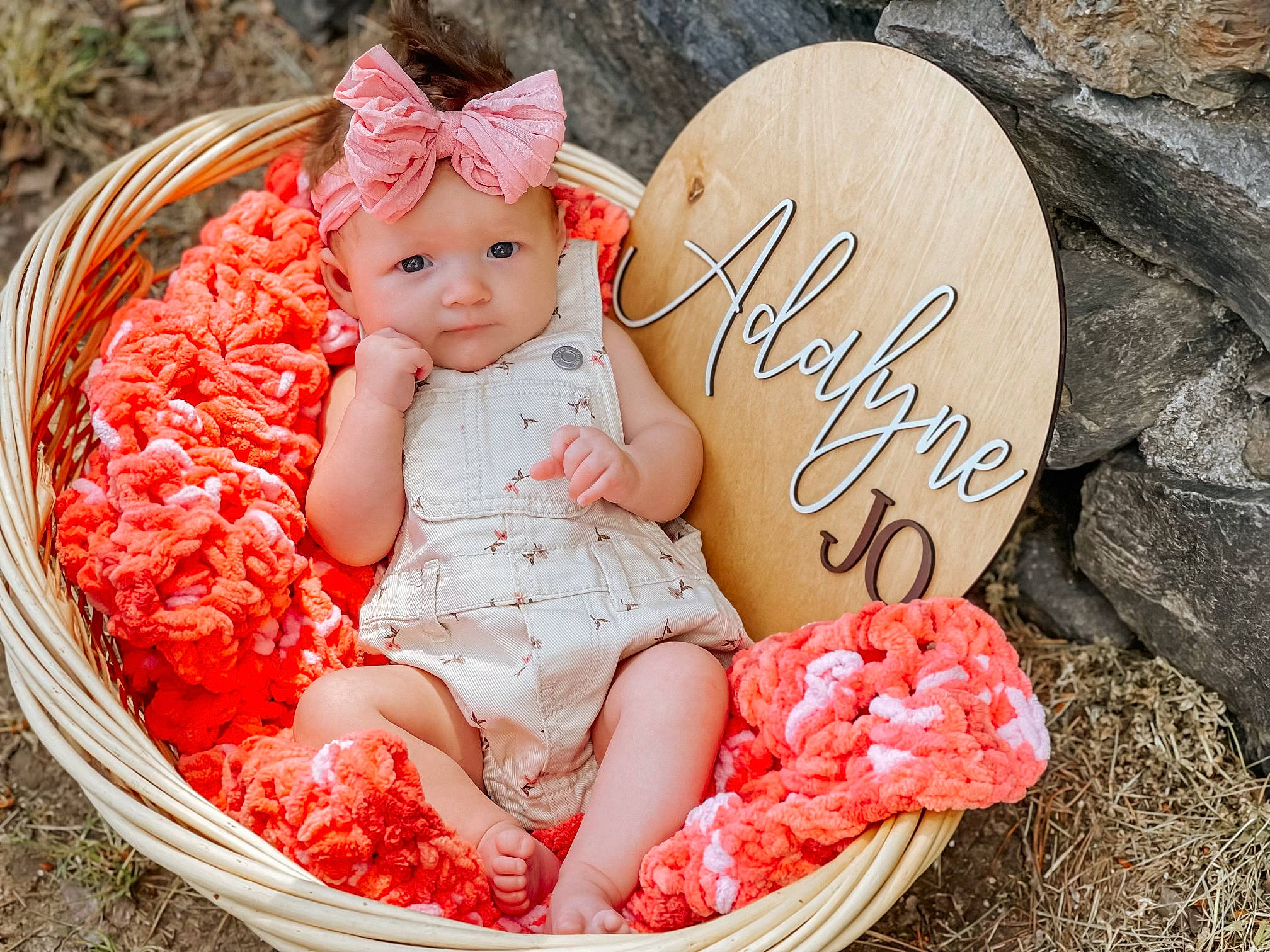 Adalyne is registered to the contest to win money with this photo: baby, baby_toddler_clothing, beauty, clothing, dress, event, facial_expression, fashion_accessory, font, grass, happy, headwear, organ, party_supply, pattern, peach, people_in_nature, person, pink, sitting