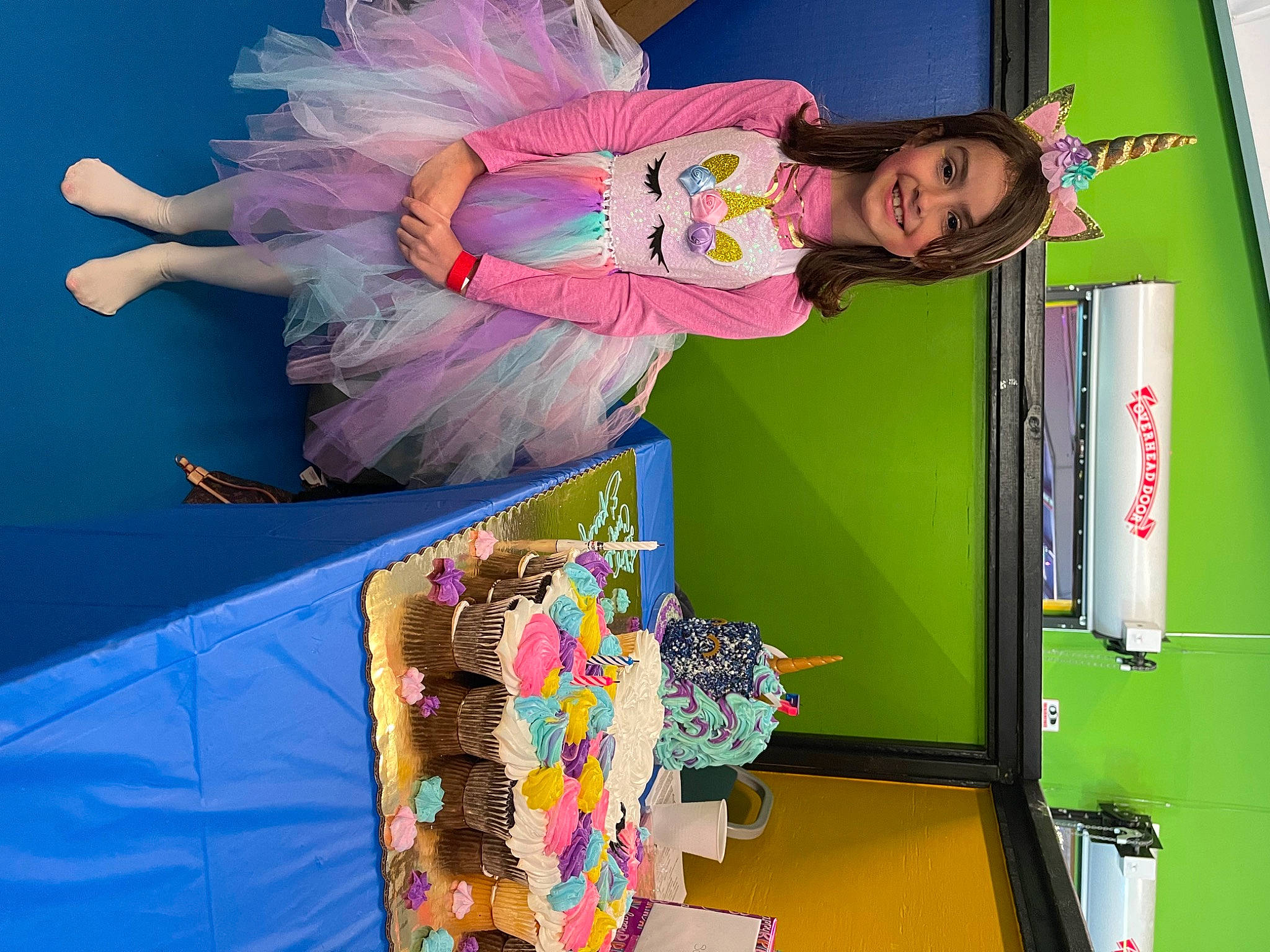 Scarlett joined the competition — help win amazing prizes! art, bookcase, child, entertainment, event, fashion_design, fun, happy, joy, magenta, paper_product, person, play, recreation, room, shelf, shelving, smile, textile, visual_arts