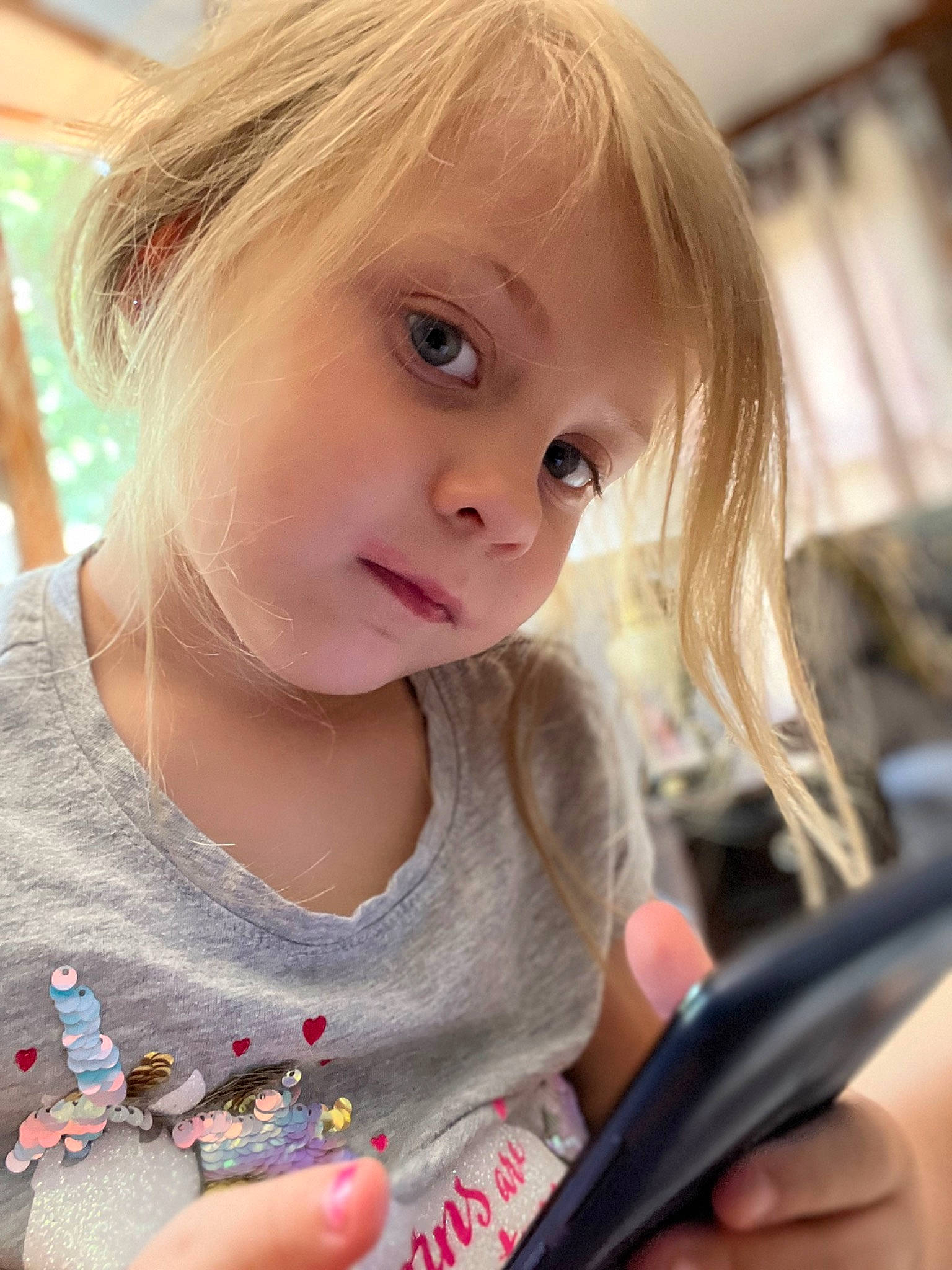 Amara is registered to the contest to win money with this photo: baby_toddler_clothing, bangs, beauty, blond, brown_hair, cheek, child, eyebrow, eyelash, finger, fun, hand, happy, lip, nail, nose, person, skin, summer, t_shirt