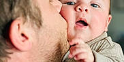 Mattéo participe au concours pour gagner de l'argent avec cette photo : baby, man, kiss, face, cheek, skin, hand, expression, candid, indoor, portrait, love, affection, closeup, child, parent, family, warmth, clothing, person