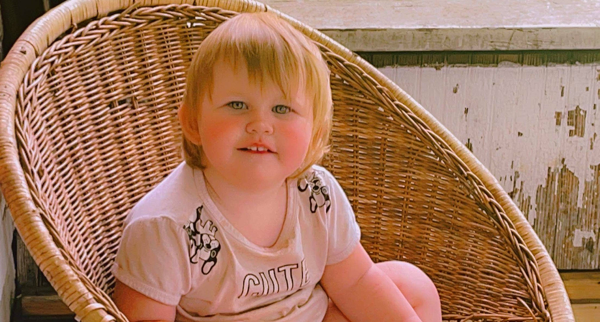 Crystal joined the competition — help win amazing prizes! baby_toddler_clothing, bangs, blond, cheek, child, chin, eye, facial_expression, fun, grass, hairstyle, happy, iris, joy, leisure, person, plant, sitting, skin, smile