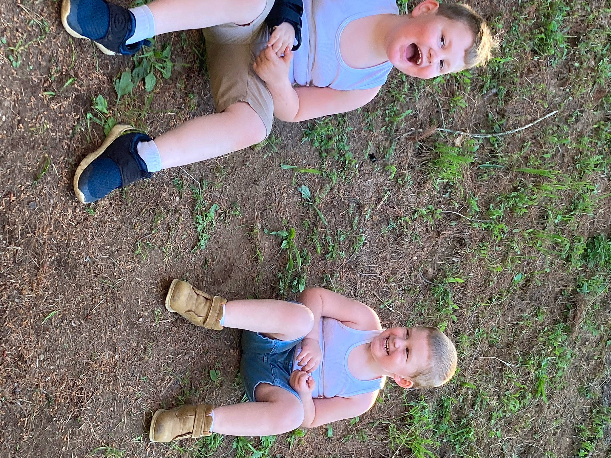 Weston is registered to the contest to win money with this photo: blue, finger, flash_photography, fun, grass, grass_family, happy, human_leg, joint, joy, knee, leg, leisure, light, people_in_nature, person, photograph, plant, shorts, snapshot