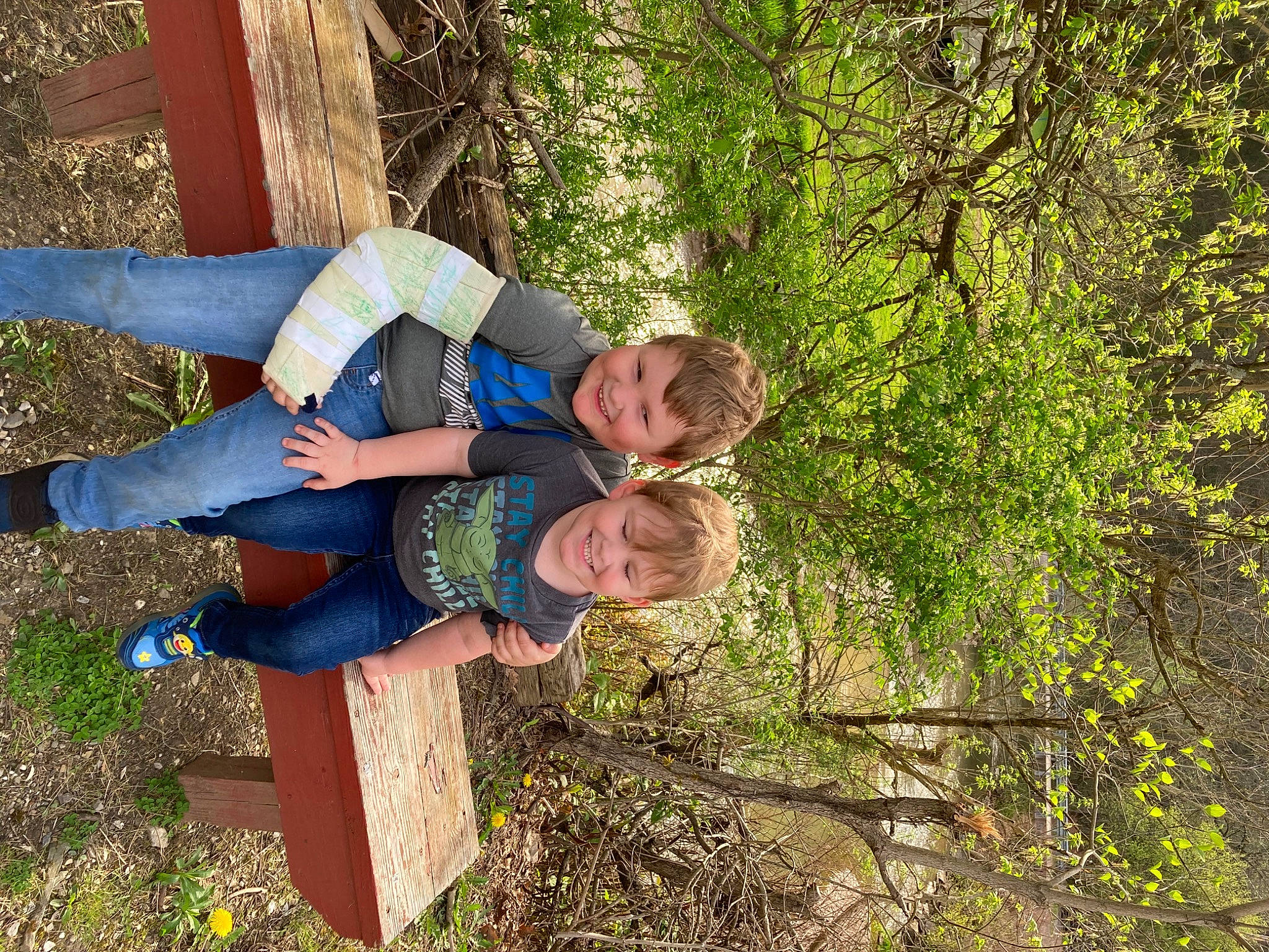 Weston is registered to the contest to win money with this photo: child, forest, fun, grass, grass_family, happy, joy, landscape, leisure, people_in_nature, person, plant, smile, soil, tree, trunk, vacation, wood, woody_plant