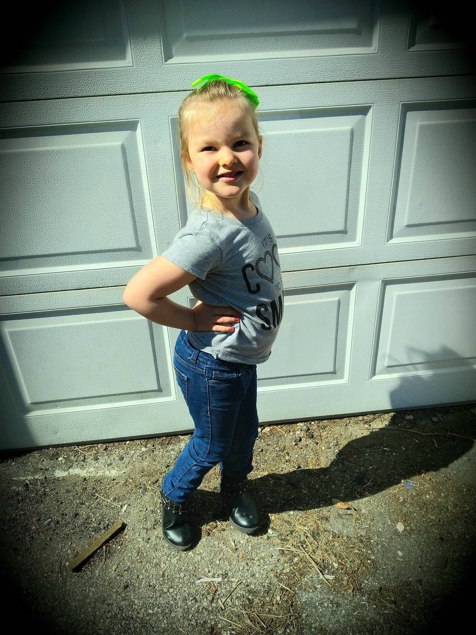 Raina joined the competition — help win amazing prizes! cool, denim, door, electric_blue, flash_photography, flooring, fun, gesture, happy, human_leg, jeans, joy, person, sitting, sleeve, smile, standing, t_shirt, tints_and_shades, toddler