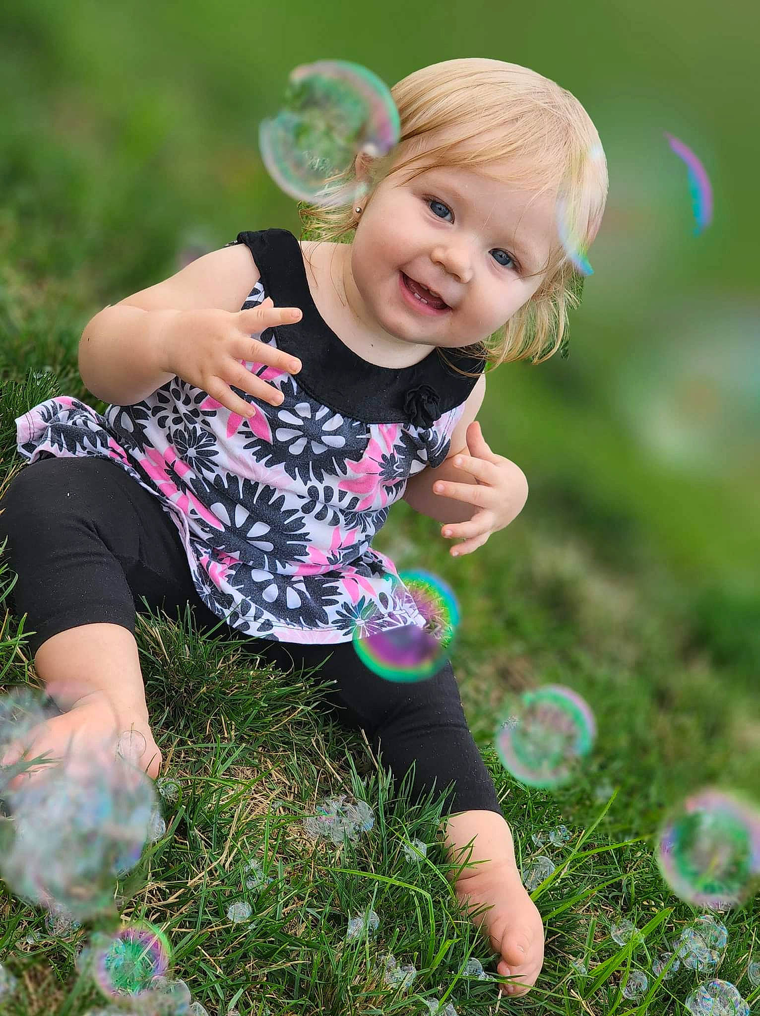 Amaya is registered to the contest to win money with this photo: botany, facial_expression, finger, flash_photography, fun, grass, green, hair, hairstyle, happy, human, joy, leaf, leisure, nature, people_in_nature, person, pink, smile, sunlight