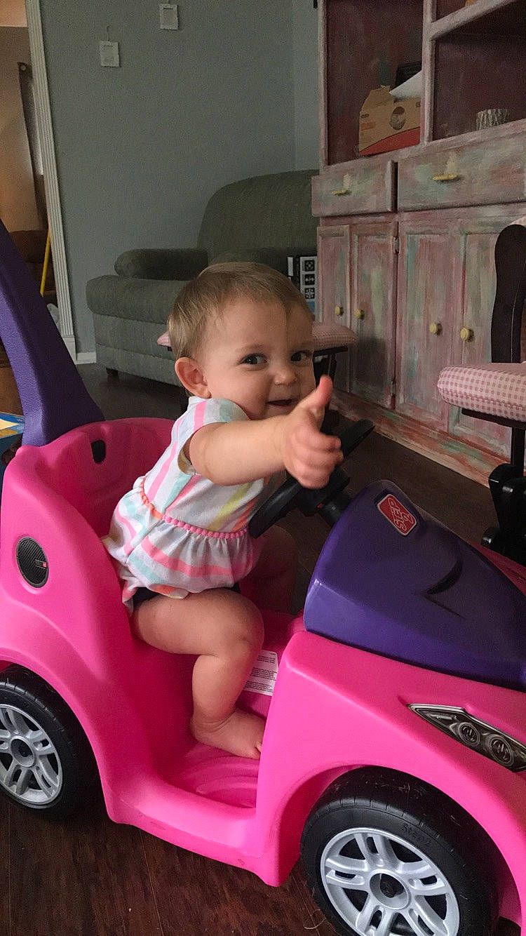 Marleigh joined the competition — help win amazing prizes! auto_part, automotive_design, automotive_exterior, baby, car, child, city_car, compact_car, hatchback, motor_vehicle, person, pink, product, subcompact_car, toddler, vehicle, vehicle_door