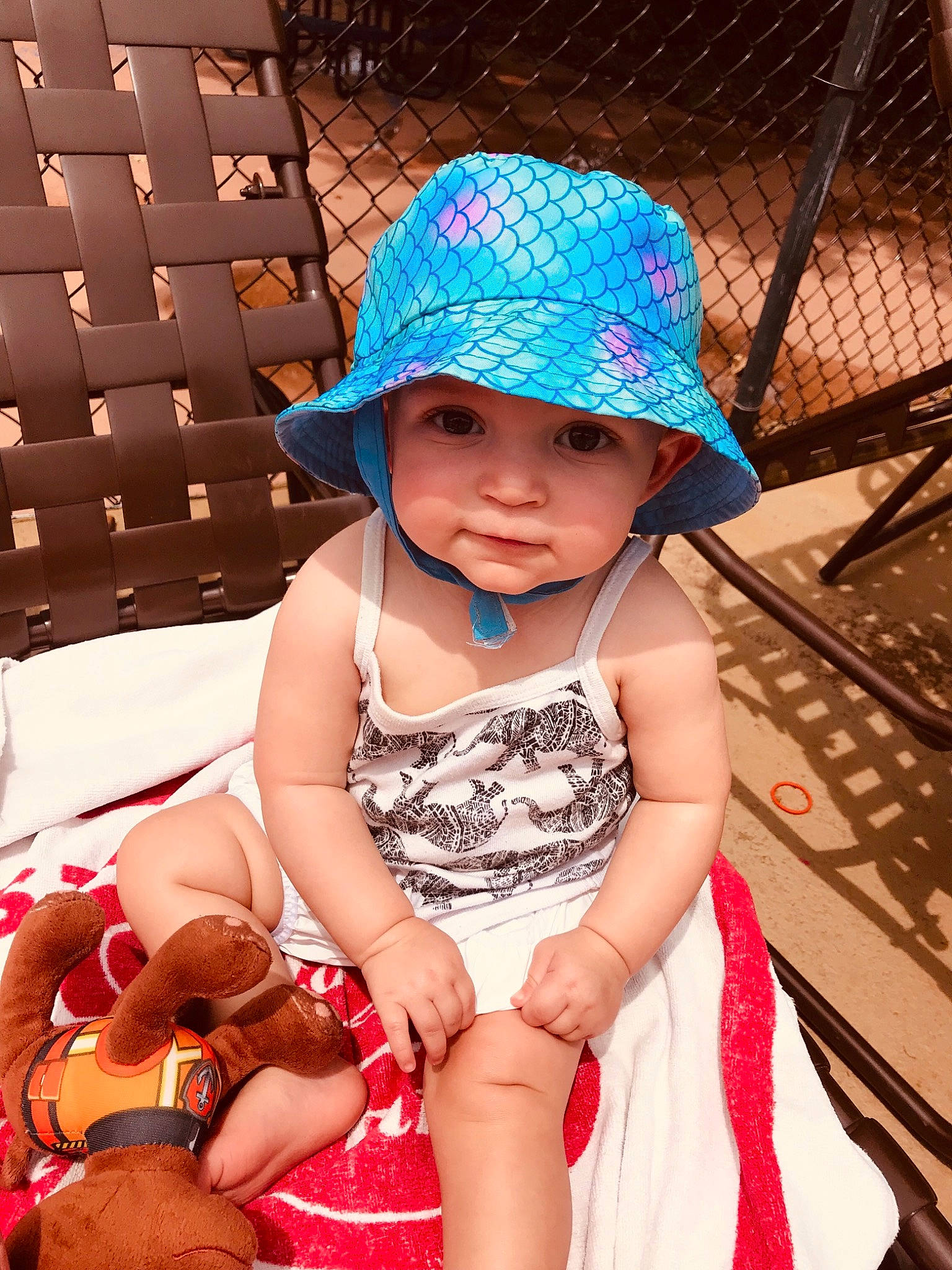 Marleigh is registered to the contest to win money with this photo: baby, bonnet, cap, child, child_model, clothing, fashion_accessory, fun, hat, headgear, headwear, person, pink, skin, smile, summer, sun_hat, toddler, vacation