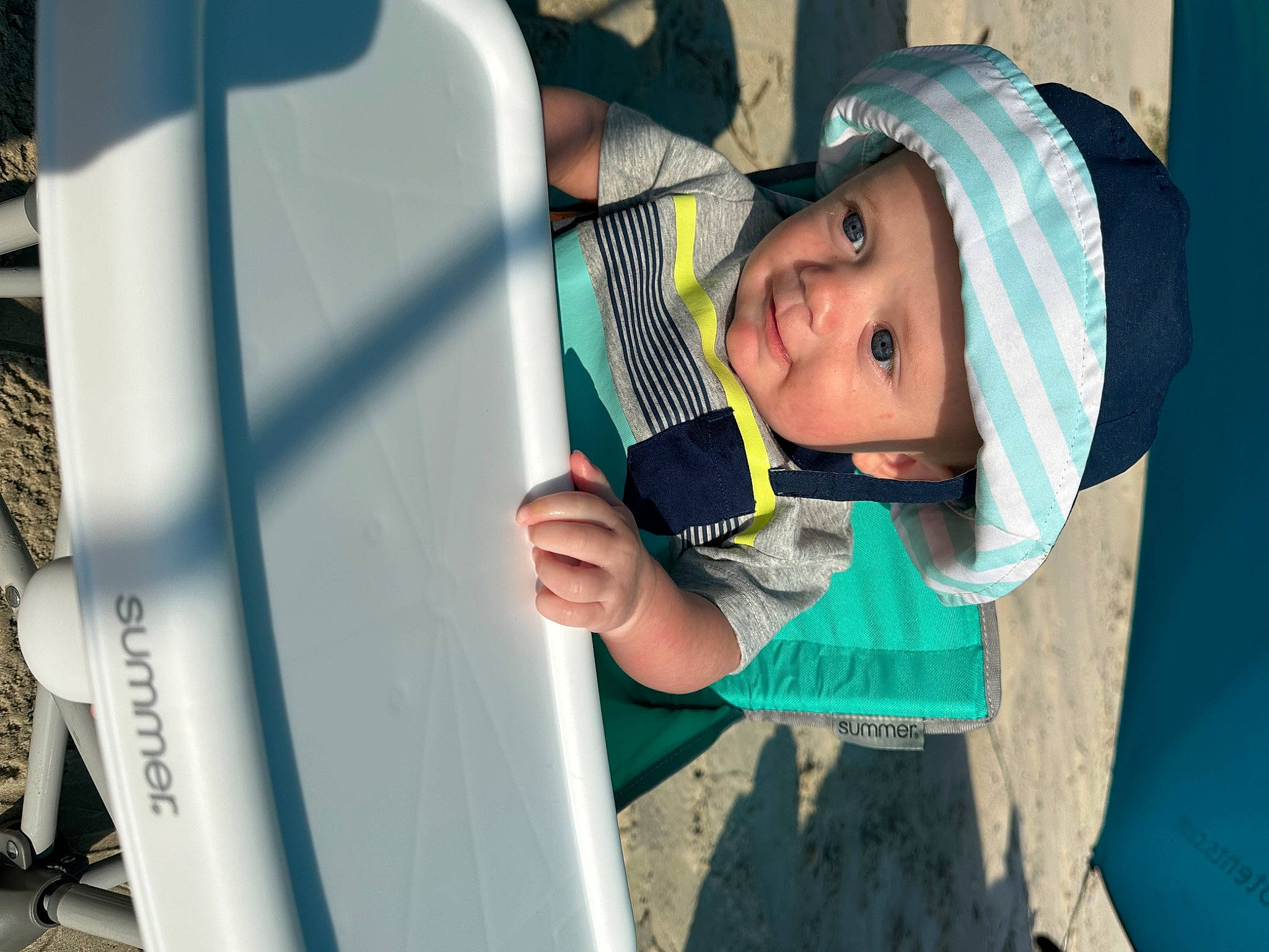 Lucian joined the competition — help win amazing prizes! baby, baseball_cap, cap, child, electric_blue, fun, hat, headwear, leisure, person, personal_protective_equipment, recreation, smile, t_shirt, toddler, vehicle_door