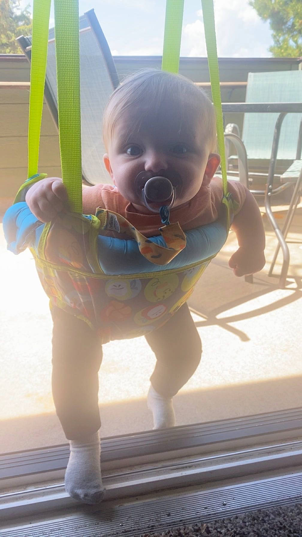 Wariah is registered to the contest to win money with this photo: baby, baby_products, baby_toddler_clothing, child, electric_blue, flooring, fun, grass, happy, leisure, light, outdoor_play_equipment, person, recreation, sitting, skin, smile, summer, swing, toddler