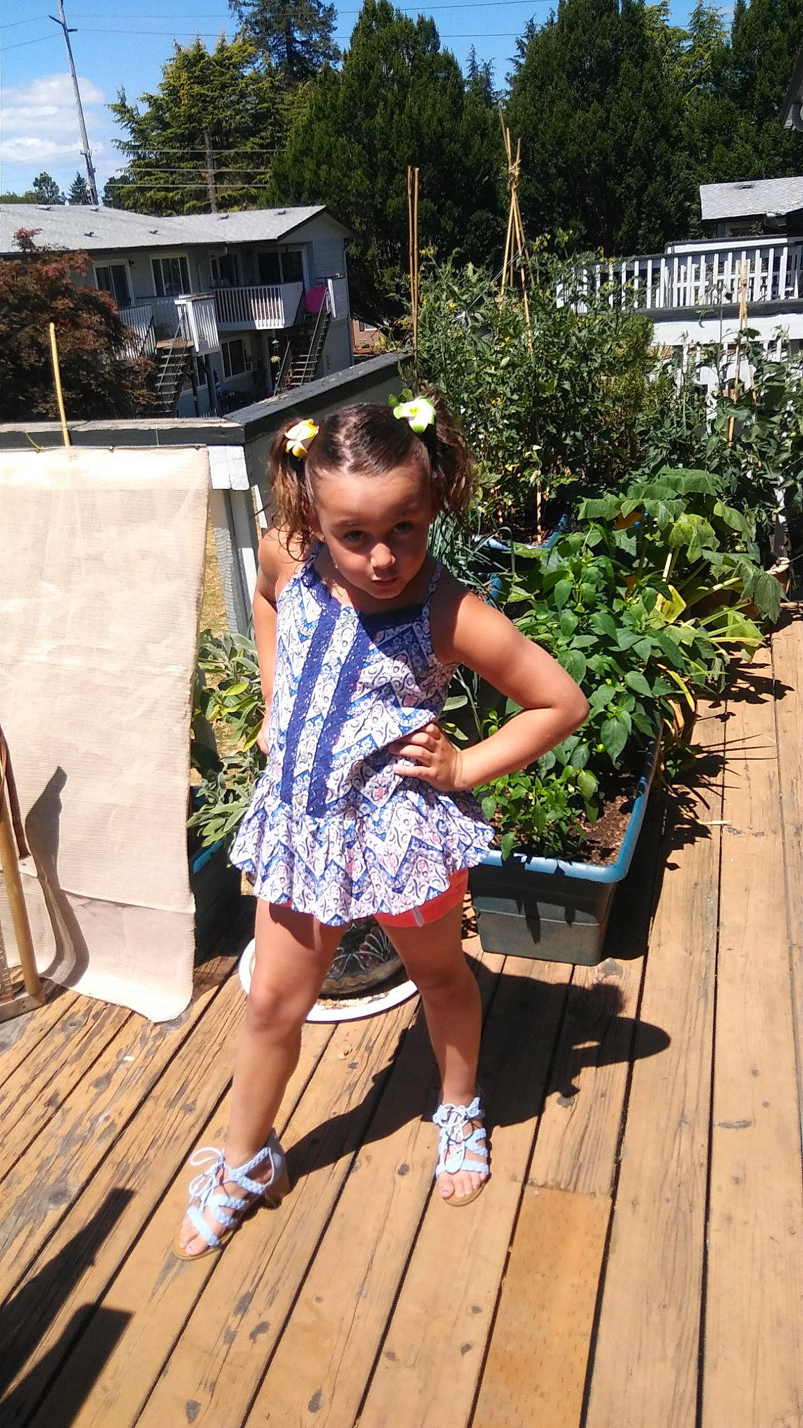 Kayda Lynne is registered to the contest to win money with this photo: child, event, fun, grass, happy, human_leg, leisure, person, plant, recreation, sandal, shoe, sitting, sneakers, thigh, toddler, tourism, travel, tree, vacation