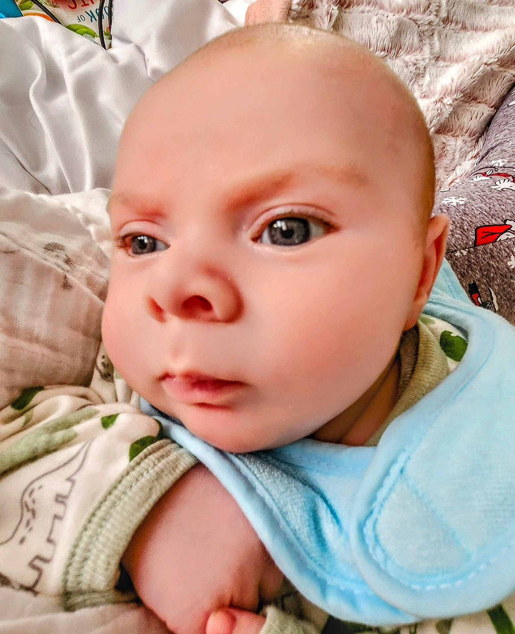 Kash is registered to the contest to win money with this photo: baby, baby_products, baby_safety, baby_toddler_clothing, cheek, child, comfort, eyelash, grass, happy, iris, linens, lip, nose, pattern, person, portrait_photography, skin, sleeve, toddler