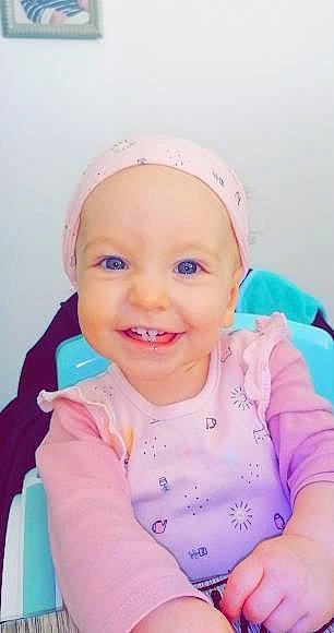 Mélia participe au concours pour gagner de l'argent avec cette photo : baby, baby_products, baby_toddler_clothing, cap, cheek, child, electric_blue, eye, fashion_accessory, fun, happy, hat, iris, joy, lip, magenta, person, pink, skin, sleeve