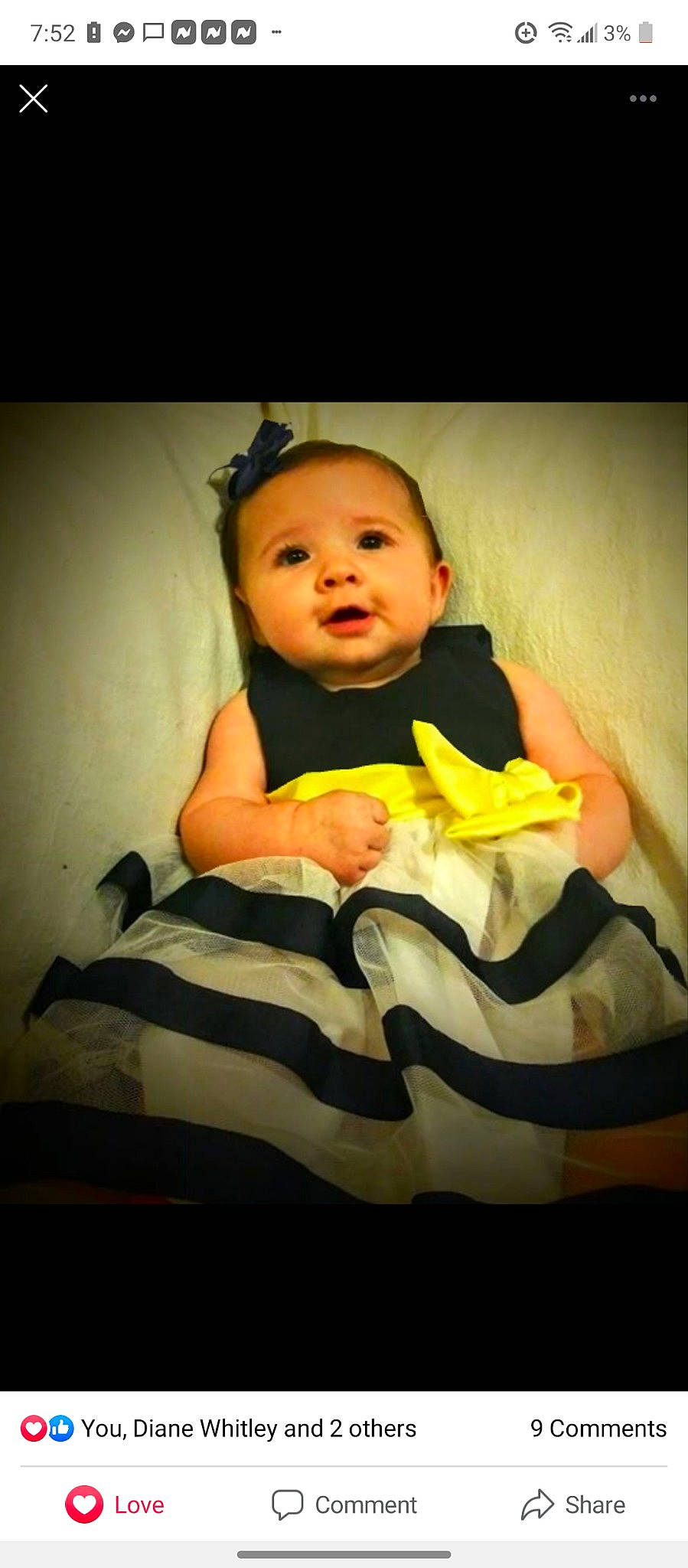 Sammie is registered to the contest to win money with this photo: abdomen, baby, baby_toddler_clothing, cheek, child, comfort, darkness, dress, flash_photography, formal_wear, fun, hand, happy, linens, person, portrait, portrait_photography, room, sitting, t_shirt