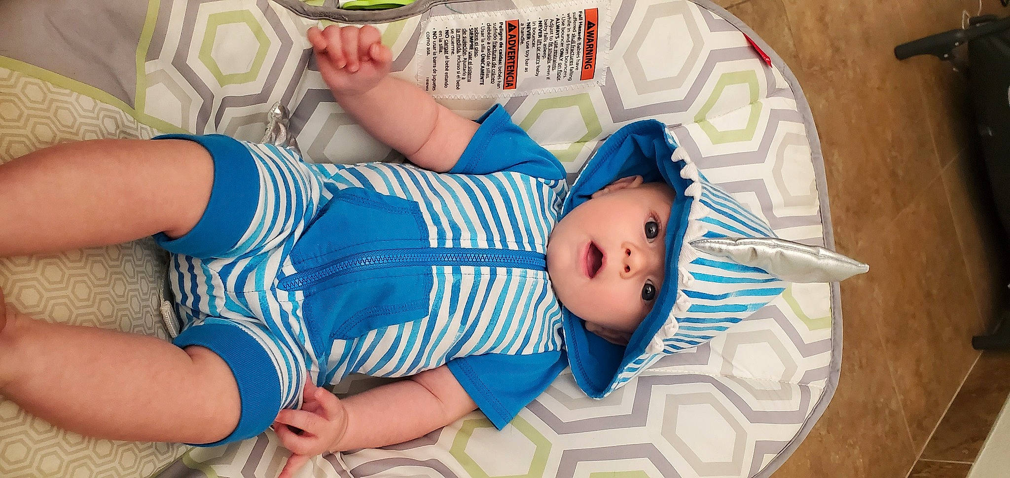 Kasen is registered to the contest to win money with this photo: baby, baby_toddler_clothing, child, comfort, dress, finger, hand, headgear, headwear, human_leg, leg, linens, nail, pattern, person, pink, product, surprise, textile, thigh