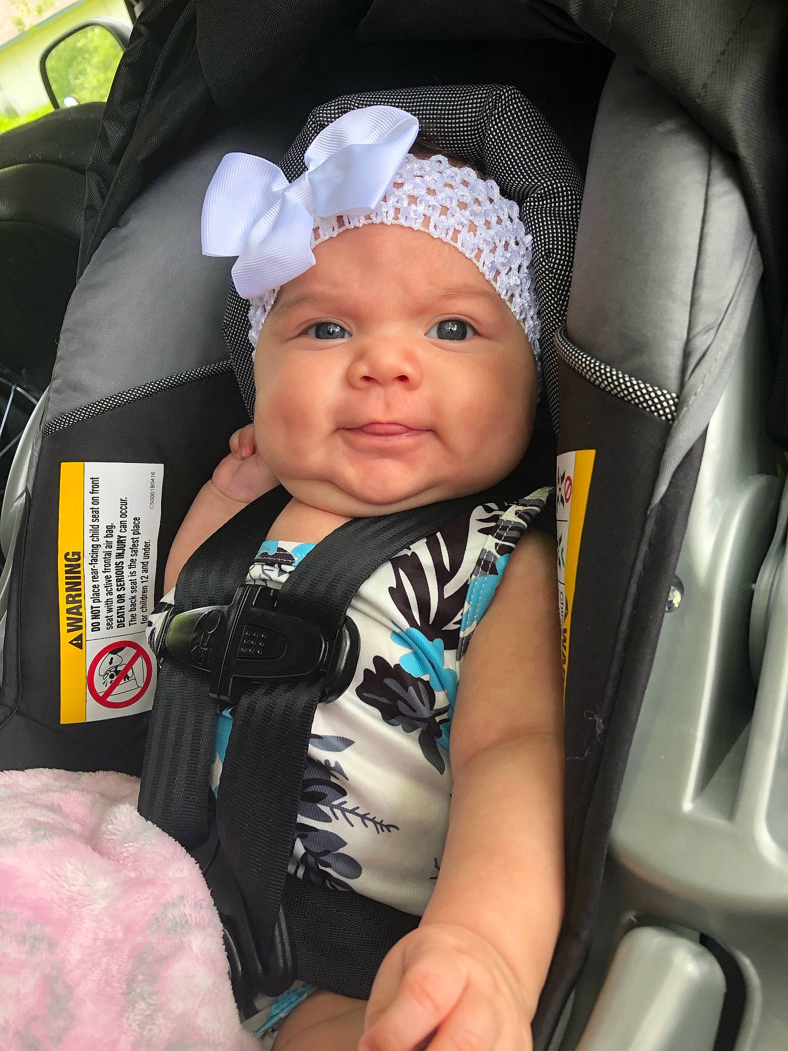 Rosabella is registered to the contest to win money with this photo: auto_part, baby, baby_carriage, baby_in_car_seat, baby_products, car_seat, child, headgear, person, product, seat_belt, toddler