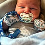Jack joined the competition — help win amazing prizes! baby, pacifier, blanket, mittens, dinosaur_pattern, blue, infant, closeup, face, sleepy, cute, newborn, soft, clothing, comfort, indoor, child, person, portrait, resting