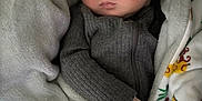 Jack is registered to the contest to win money with this photo: baby, blanket, child, closeup, clothing, comfort, cozy, cute, hand, indoor, infant, peaceful, person, portrait, rest, sleep, sleeping, soft, warm, young