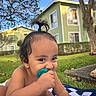 Tania joined the competition — help win amazing prizes! baby, child, pacifier, outdoor, grass, tree, house, smile, cute, bracelet, earrings, blanket, blue_sky, sunlight, portrait, infant, playtime, nature, happy, chewing