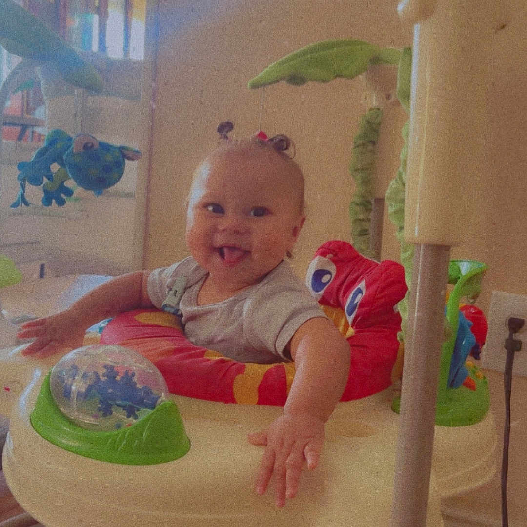 Blessyn is registered to the contest to win money with this photo: architecture, baby, building, chair, cream, dessert, diningroom, diningtable, face, food, furniture, head, icing, indoors, livingroom, person, photography, portrait, room, table