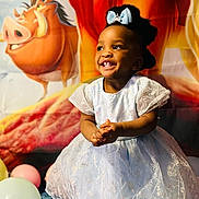 Chinyere is registered to the contest to win money with this photo: baby, babylaughing, balloon, blackhair, child, clothing, dress, face, female, girl, happy, head, laughing, people, person, photography, portrait, sitting, sleeve, smile