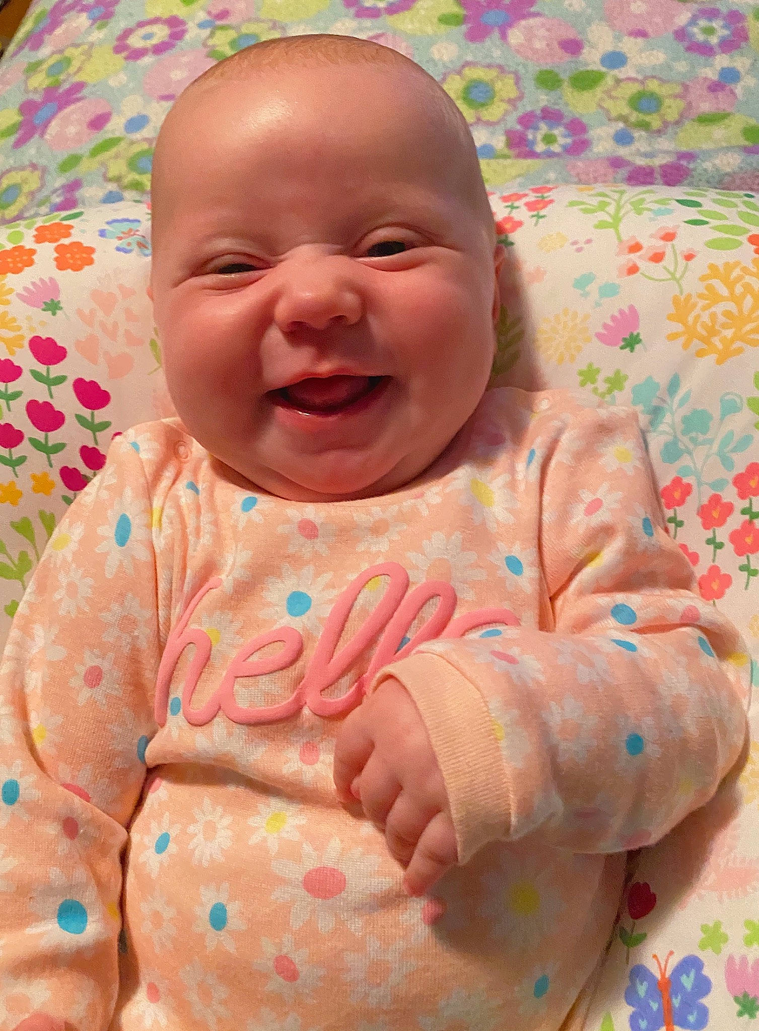 Annika joined the competition — help win amazing prizes! baby, cheek, child, face, facial_expression, head, lip, mouth, nose, pattern, person, pink, skin, smile, textile, toddler