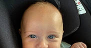 Axton joined the competition — help win amazing prizes! baby, child, car_seat, blanket, smile, face, blue_eyes, clothing, infant, cute, human, portrait, seatbelt, indoor, baby_girl, baby_boy, head, hand, young_child, comfort