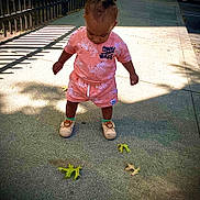Apollo joined the competition — help win amazing prizes! bear, child, clothing, concrete, curious, daylight, fence, green_socks, hair, leaves, outdoor, person, shadow, shoes, shorts, sidewalk, standing, sunlight, toddler, tshirt