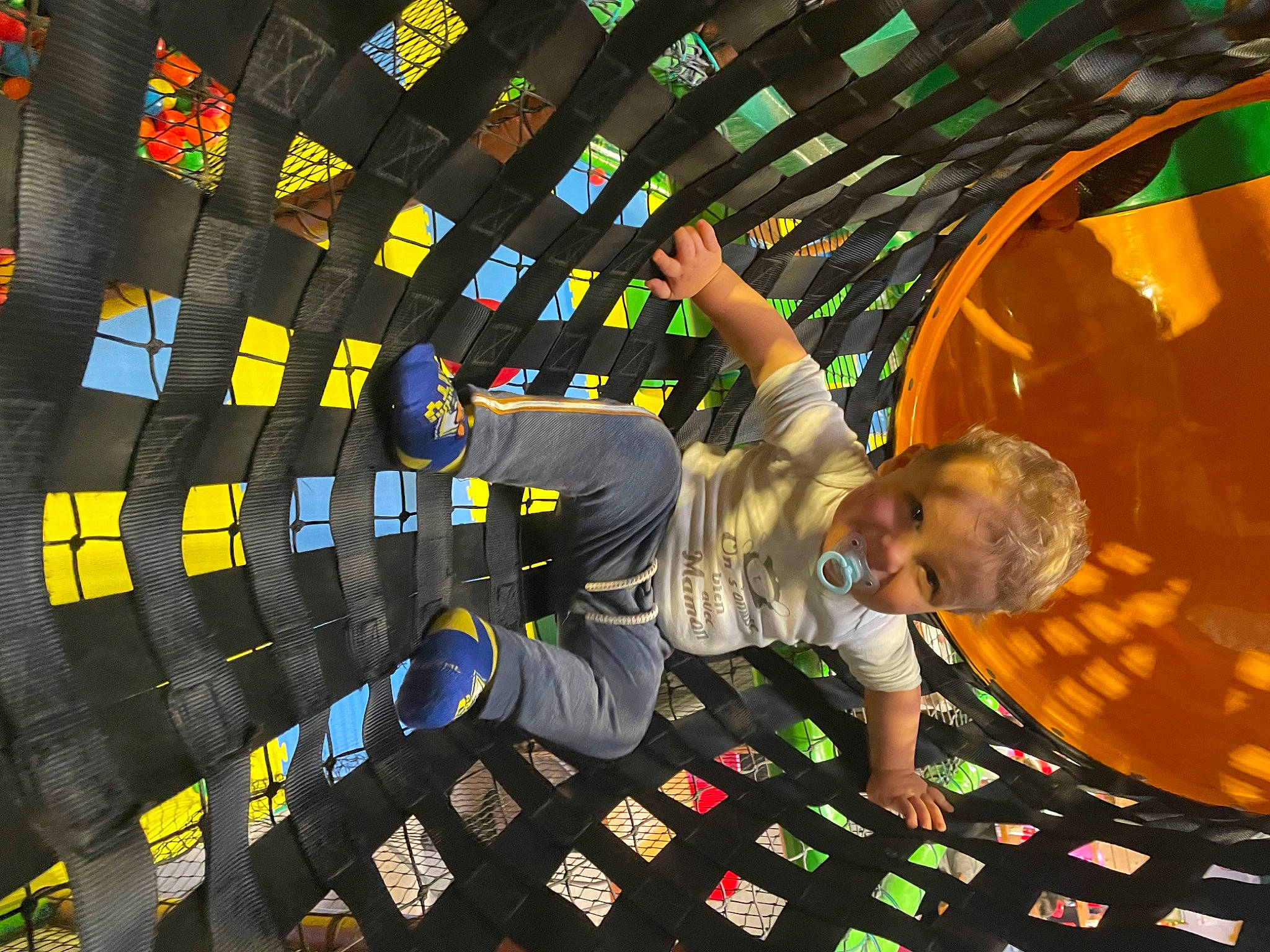 Malhon participe au concours pour gagner de l'argent avec cette photo : automotive_tire, automotive_wheel_system, child, circle, flooring, font, fun, games, grass, leisure, pattern, person, play, recreation, room, space, symmetry, t_shirt, toddler, world