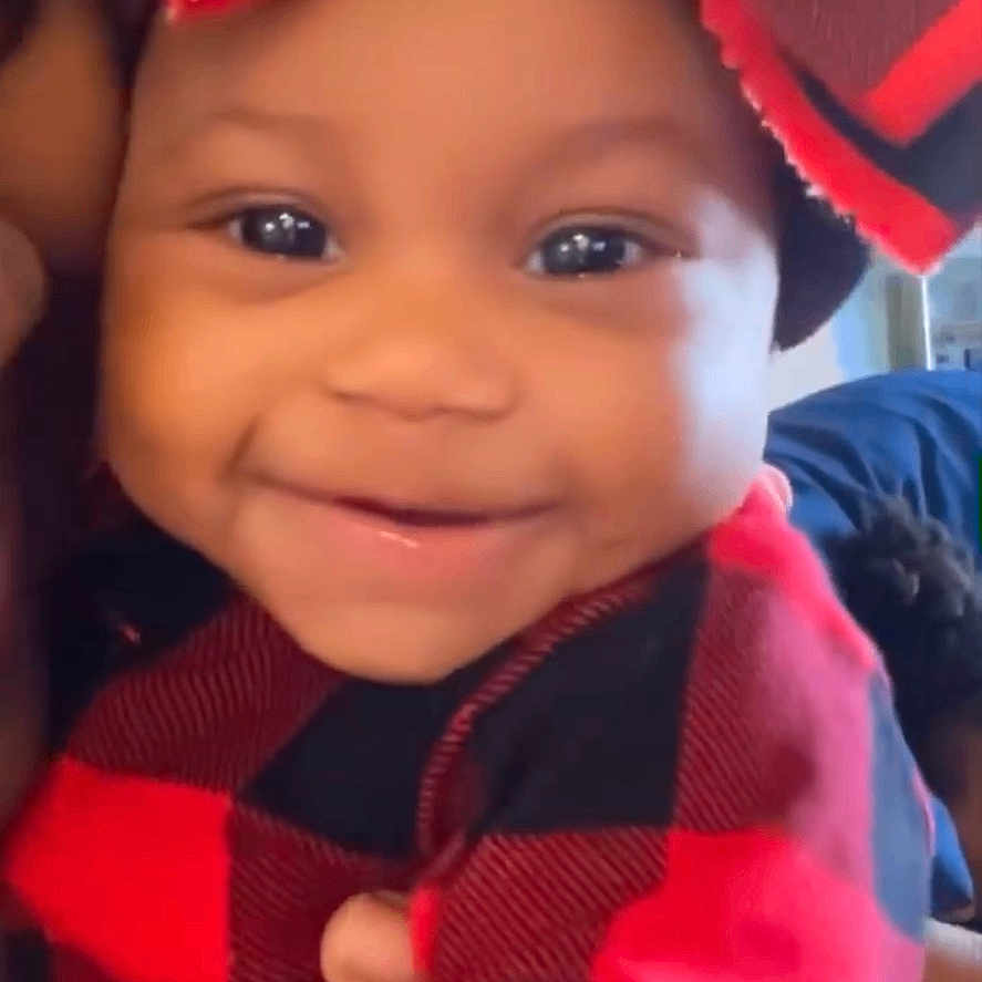 Meilani joined the competition — help win amazing prizes! baby, babylaughing, clothing, face, happy, hat, head, laughing, person, photography, portrait, smile