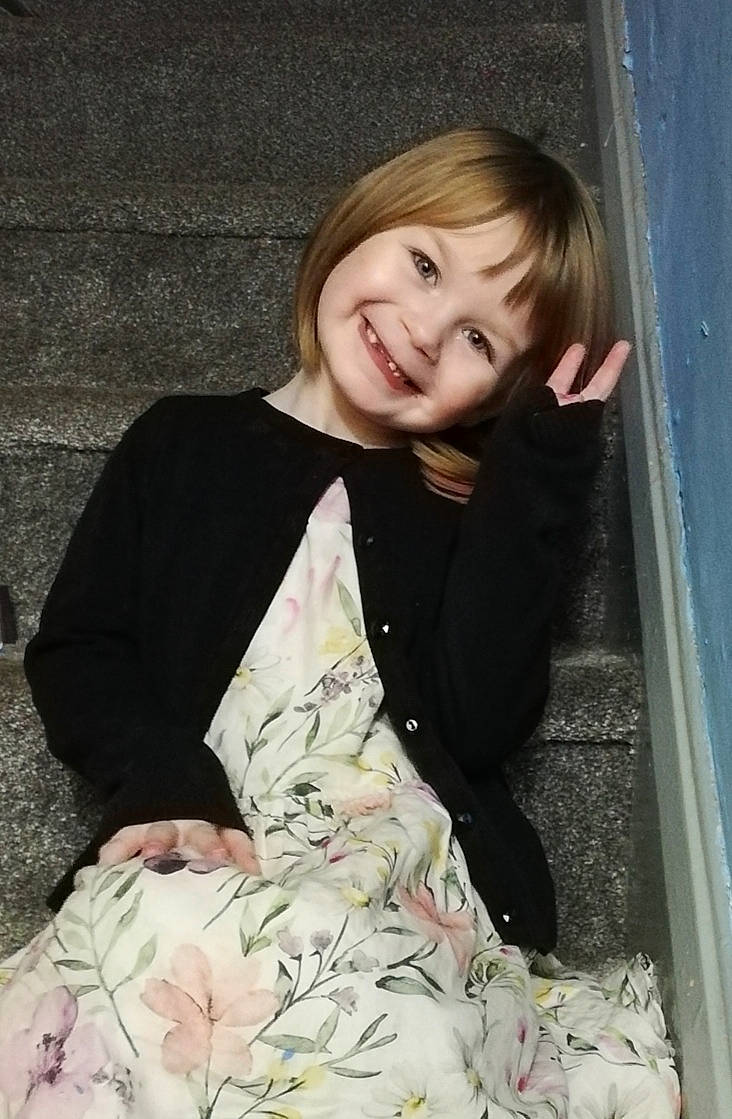 Lilly Ann is registered to the contest to win money with this photo: baby_toddler_clothing, bangs, blond, child, day_dress, dress, eye, formal_wear, hair, happy, joy, linens, nightwear, outerwear, pattern, peach, person, sitting, sleeve, smile