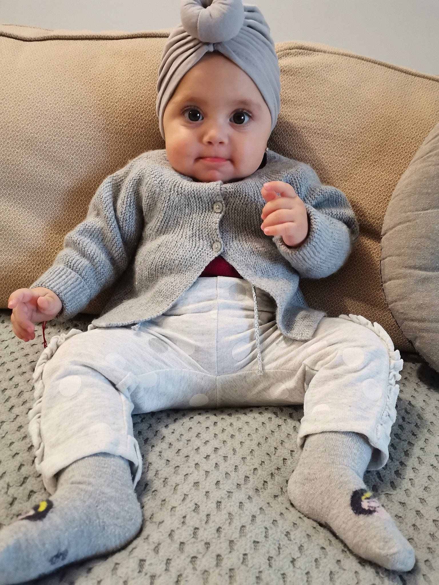 Vladiana participe au concours pour gagner de l'argent avec cette photo : arm, baby, baby_toddler_clothing, cap, cheek, child, comfort, eye, face, head, headgear, headwear, leg, outerwear, person, skin, sleeve, textile, thigh, toddler
