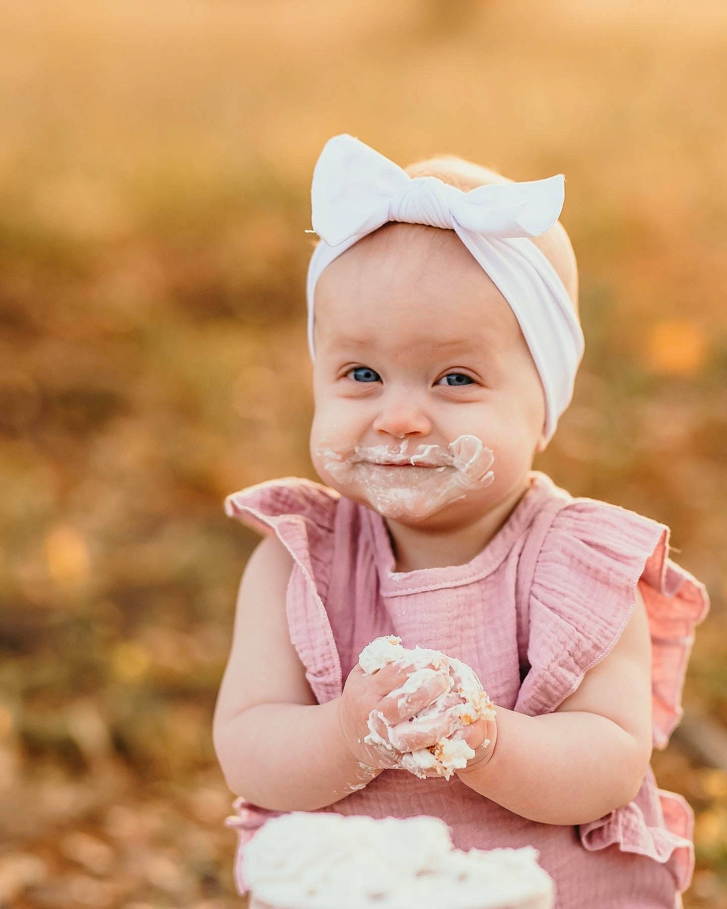 Sailor joined the competition — help win amazing prizes! baby, baby_toddler_clothing, child, fashion_accessory, flash_photography, gesture, grass, hair_accessory, happy, head, headband, headpiece, peach, people_in_nature, person, portrait_photography, sitting, skin, sleeve, smile