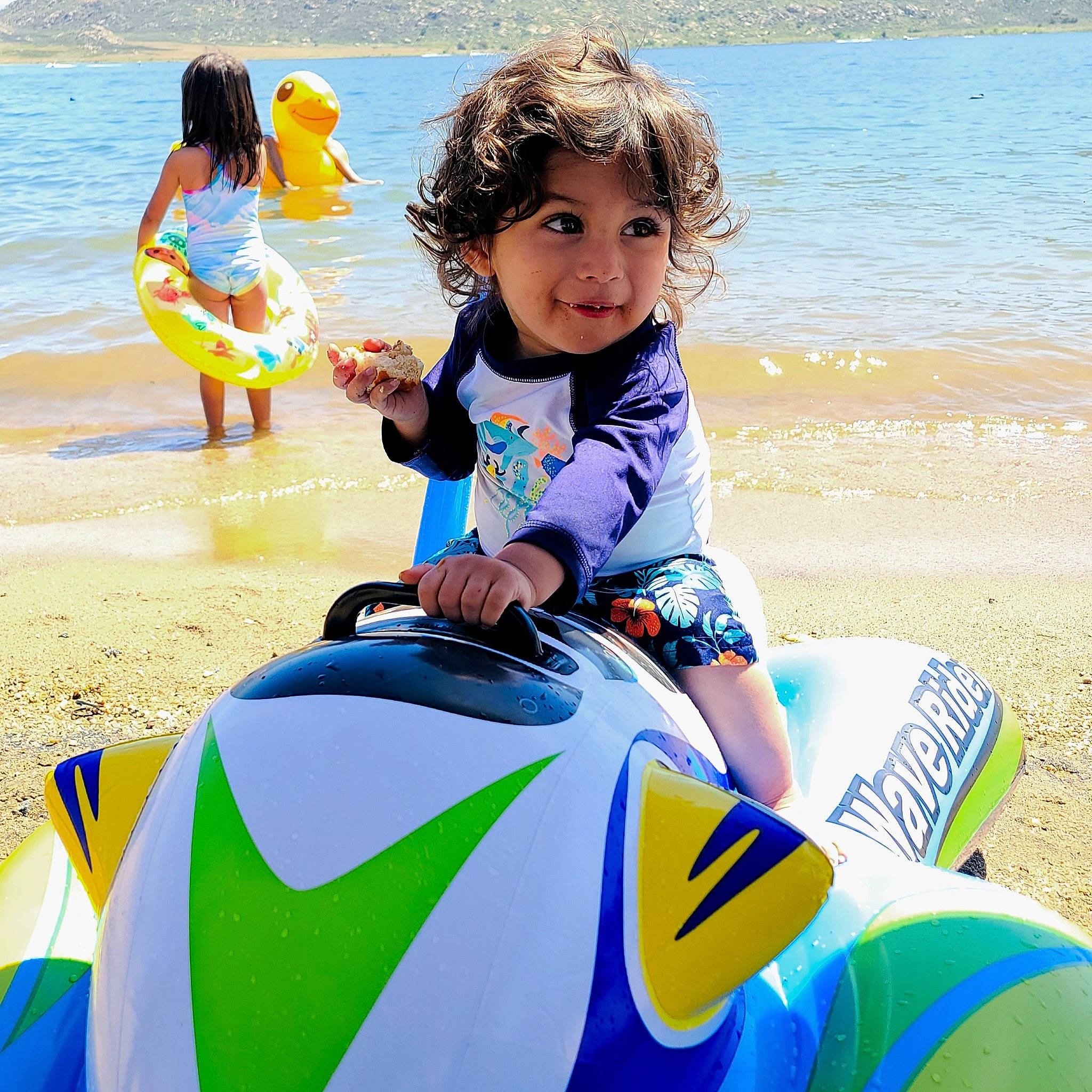 Jaizel is registered to the contest to win money with this photo: aqua, azure, beach, body_of_water, fun, happy, joy, leisure, morning, natural_environment, people_in_nature, people_on_beach, person, photograph, recreation, sand, smile, summer, t_shirt, toddler