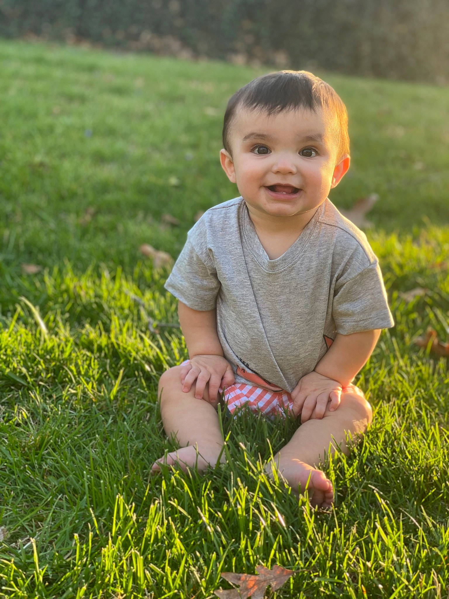Brysen is registered to the contest to win money with this photo: baby, baby_toddler_clothing, child, field, fun, grass, grassland, groundcover, hairstyle, happy, joy, meadow, people_in_nature, person, plant, prairie, sitting, skin, smile, standing