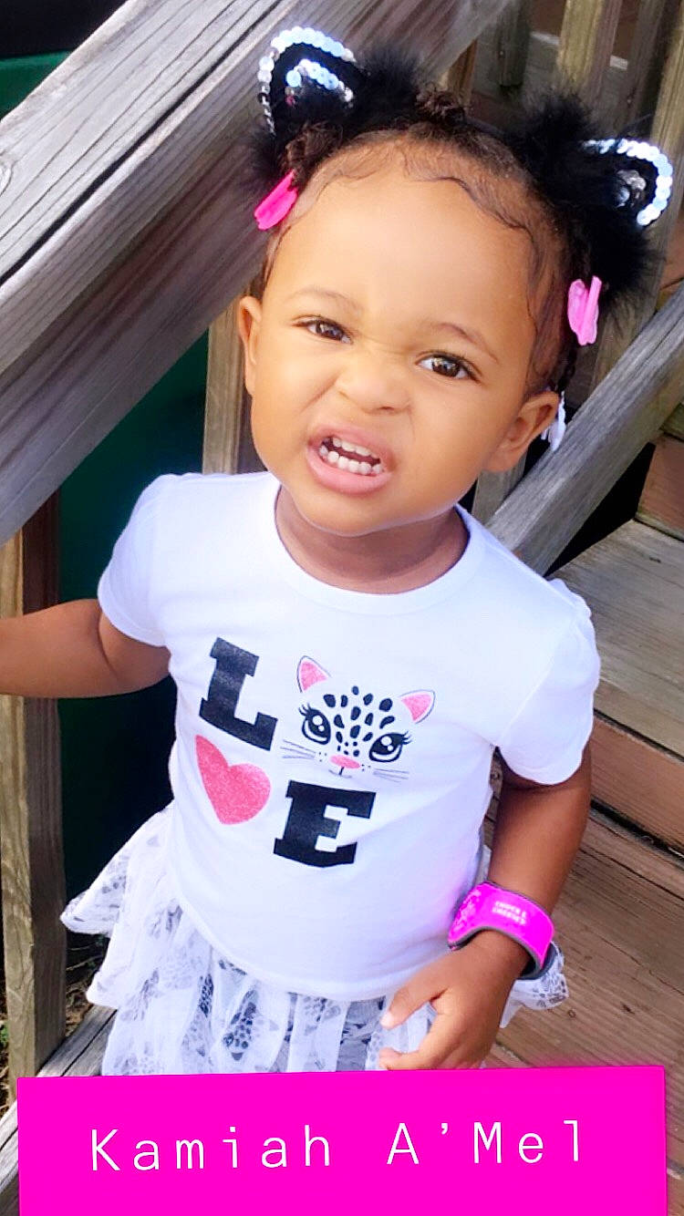 Kamiah is registered to the contest to win money with this photo: baby, baby_toddler_clothing, child, child_model, cool, daughter, hair, hairstyle, headband, person, pink, play, product, skin, t_shirt, toddler