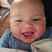 Magnus joined the competition — help win amazing prizes! baby, child, smiling, face, closeup, blanket, happy, cute, infant, portrait, chubby_cheeks, indoors, person, clothing, skin, eyes, mouth, joy, expression, toddler