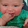 Magnus joined the competition — help win amazing prizes! baby, child, blue_eyes, cheeks, fingers, green_shirt, patterned_clothing, blanket, closeup, smiling, cute, infant, person, indoors, portrait, hand, skin, face, happy, young