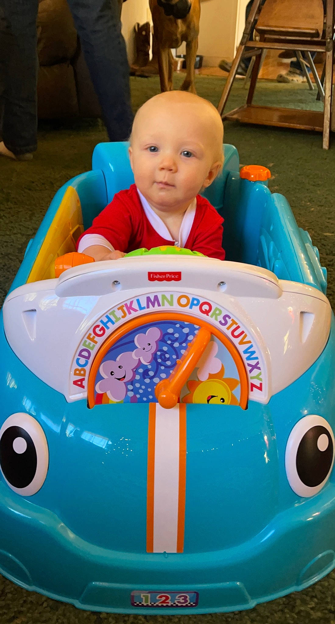 Braxton is registered to the contest to win money with this photo: automotive_exterior, baby, baby_playing_with_toys, baby_products, baby_toddler_clothing, baby_toys, blue, bumper, child, electric_blue, font, fun, leisure, motor_vehicle, person, play, recreation, riding_toy, toddler, toy