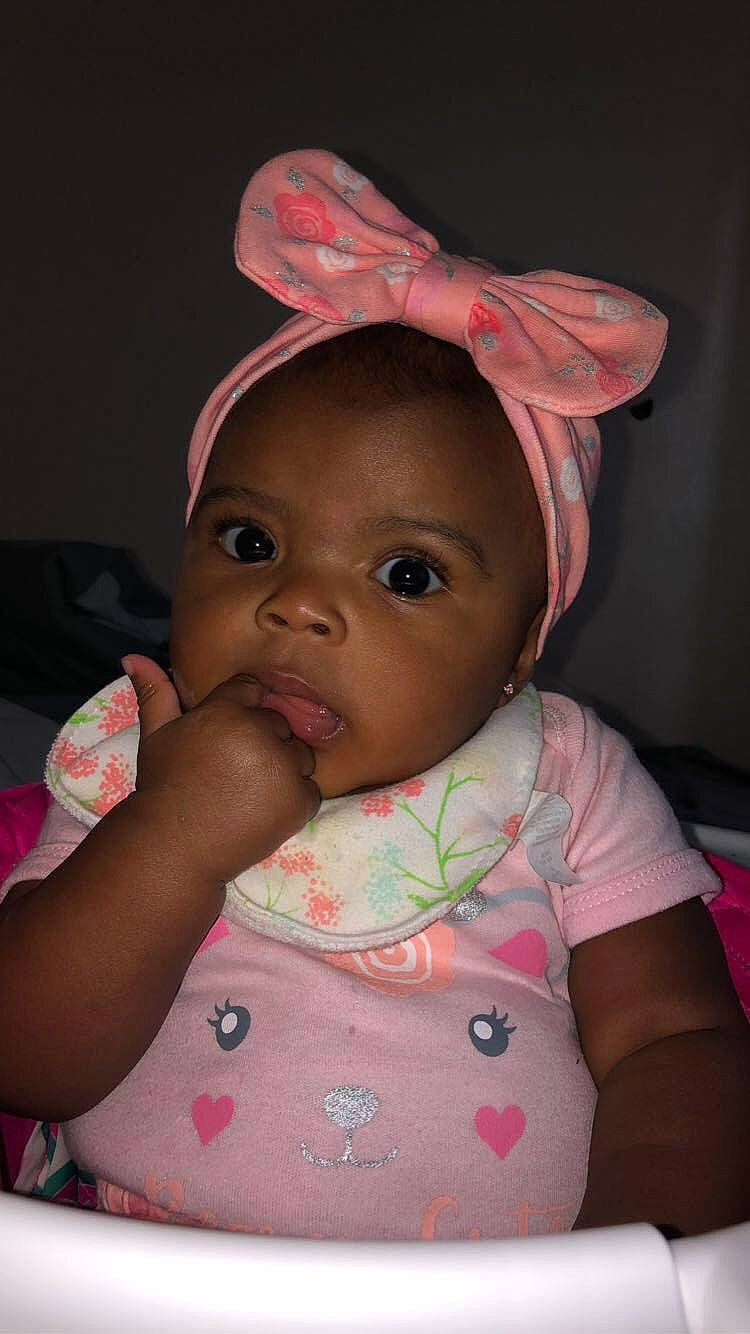 Abriella is registered to the contest to win money with this photo: baby, baby_toddler_clothing, cap, cheek, child, chin, costume_hat, eyebrow, eyelash, finger, happy, headgear, human_body, iris, lip, mouth, nose, person, pink, skin