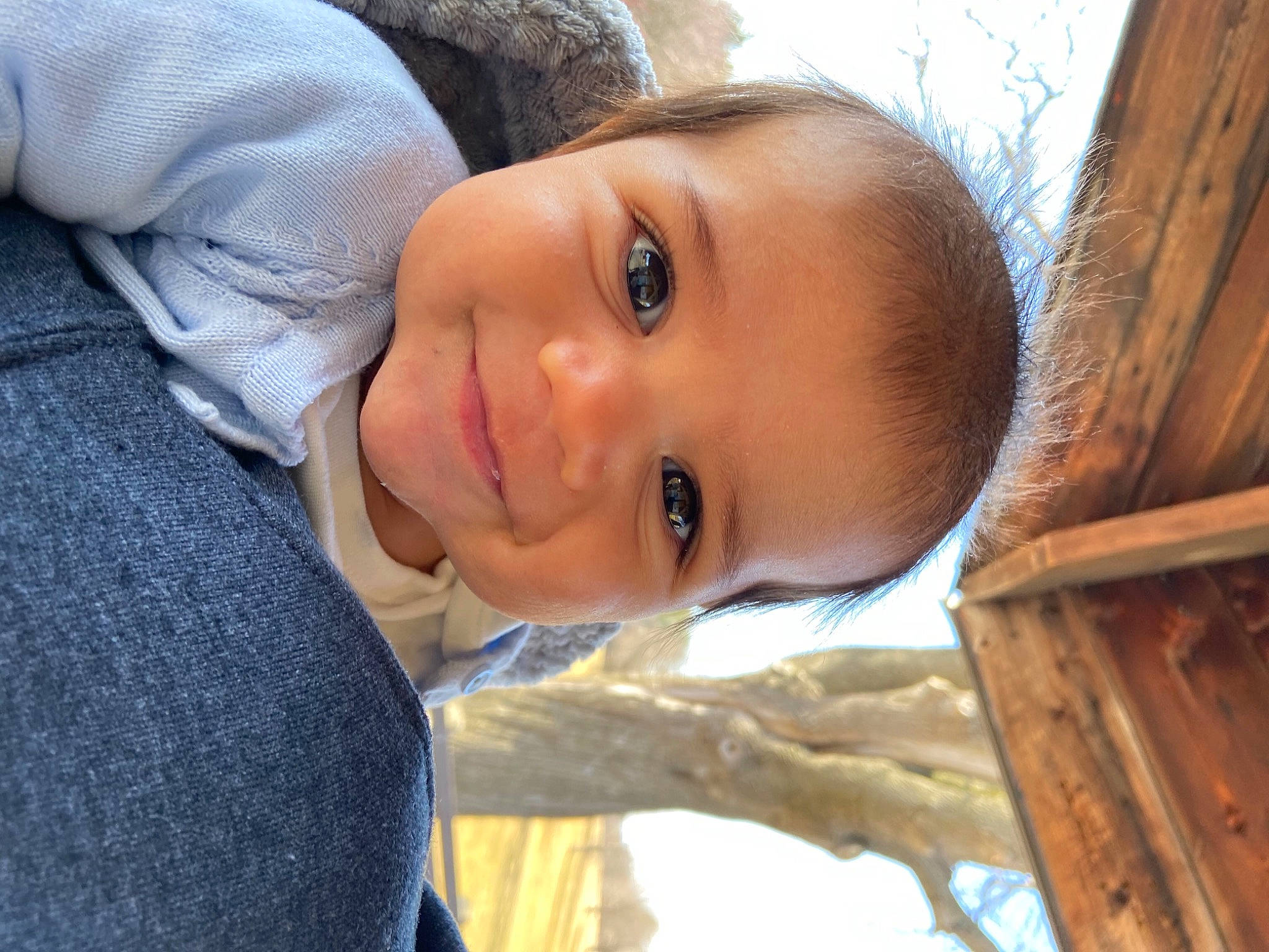 Remi is registered to the contest to win money with this photo: cheek, child, clothing, fun, grass, happy, joy, leisure, lip, nose, person, plant, portrait, portrait_photography, skin, smile, toddler, tree, vacation, wood