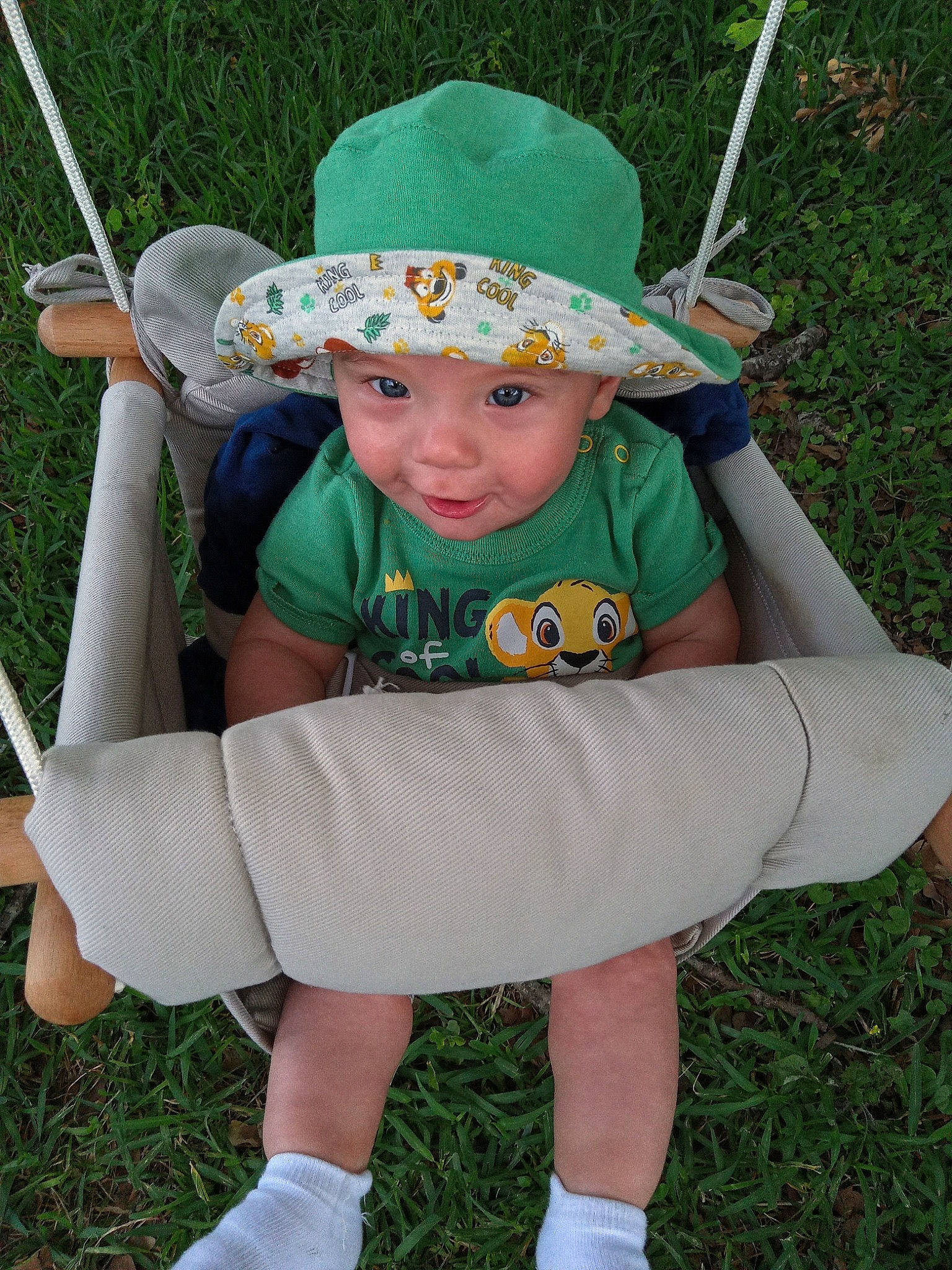 Austin joined the competition — help win amazing prizes! baby_toddler_clothing, baseball_cap, cap, child, fun, grass, grassland, green, happy, hat, headgear, headwear, lawn, leg, leisure, person, product, recreation, shorts, summer