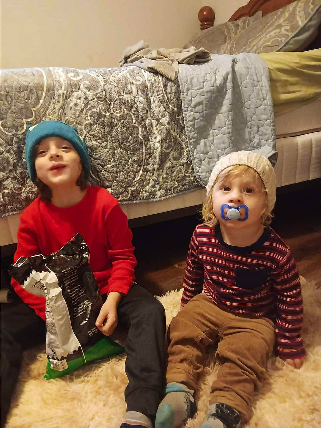 Kai is registered to the contest to win money with this photo: baby, baby_toddler_clothing, boot, child, comfort, couch, eye, flooring, fun, happy, headwear, human_body, jacket, leisure, mammal, person, shoe, sitting, skin, toddler