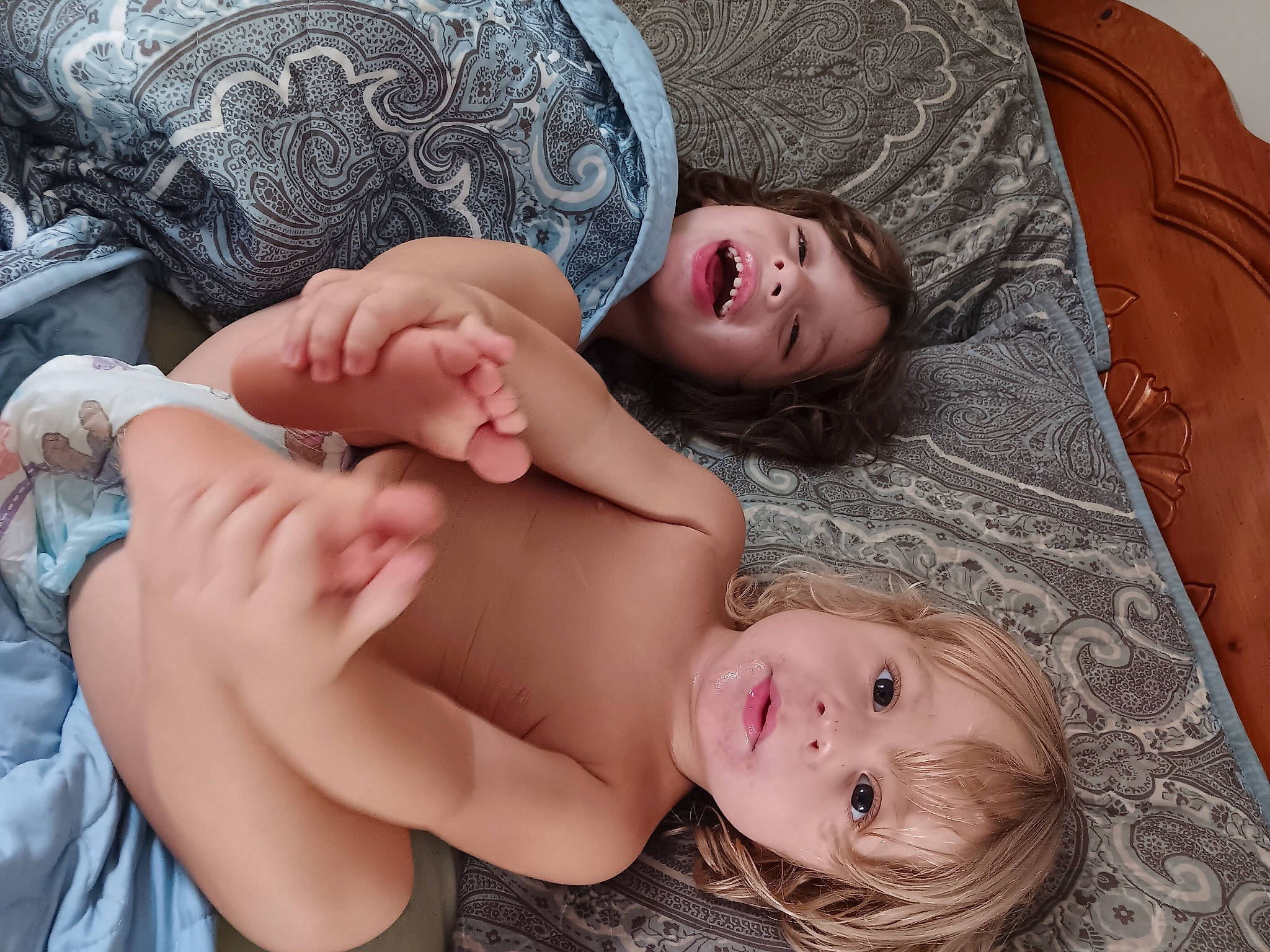 Kai is registered to the contest to win money with this photo: abdomen, baby, cheek, chest, child, comfort, facial_expression, fun, grass, happy, jewellery, linens, mouth, muscle, pattern, person, skin, smile, stomach, toddler