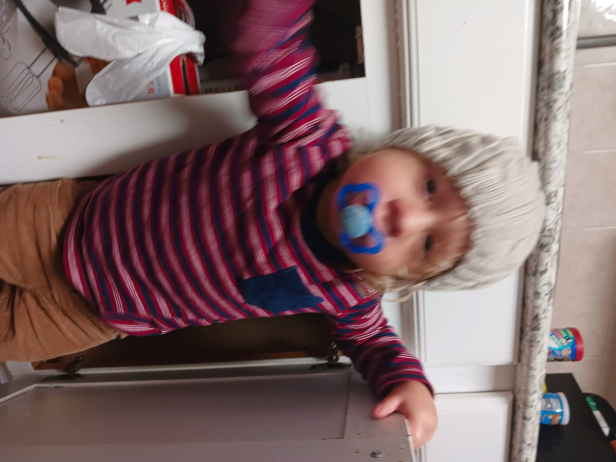 Kai joined the competition — help win amazing prizes! baby, baby_products, baby_toddler_clothing, child, comfort, elbow, fun, headwear, human_body, human_leg, joint, knee, magenta, person, play, room, sitting, sleeve, t_shirt, thigh