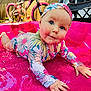 baby, child, toddler, swimsuit, headband, pink_pool, water, bicycle, outdoor, play, summer, splashing, colorful_clothing, rosy_cheeks, blue_eyes, folding_chair, sunlight, backyard, fun, happy