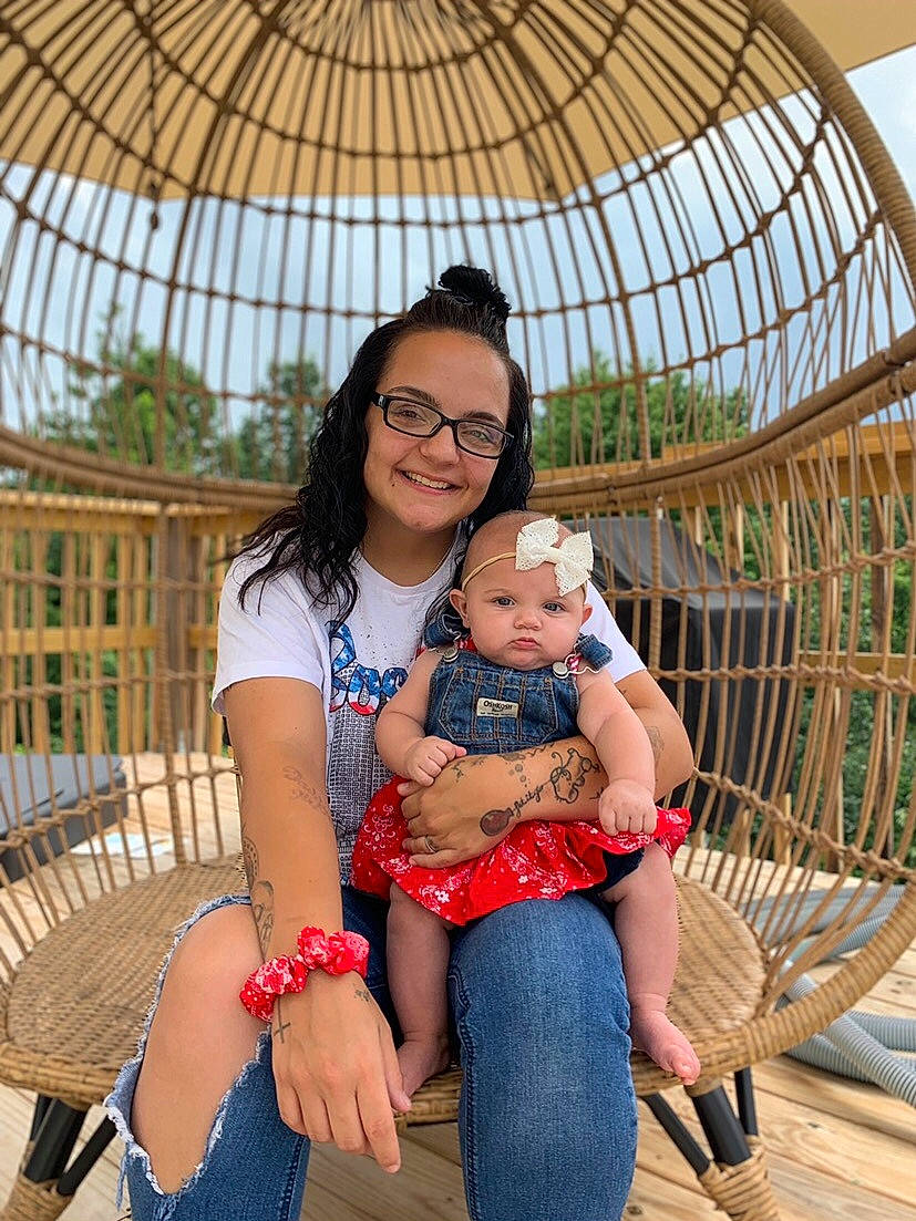 Karsyn is registered to the contest to win money with this photo: abdomen, child, family, fawn, headwear, joy, leisure, people, person, photography, plant, sitting, toddler, tourism, vacation