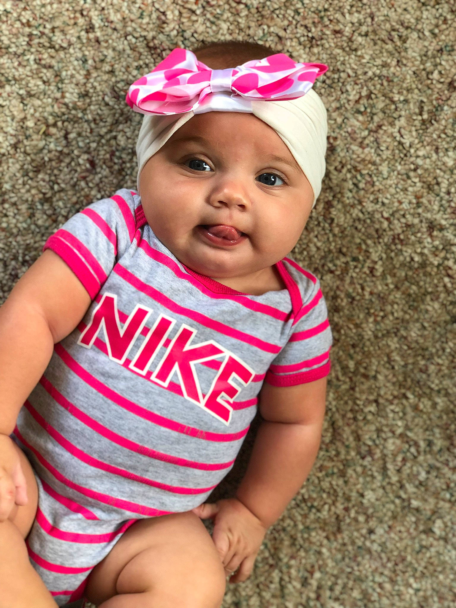 Karsyn joined the competition — help win amazing prizes! baby, baby_products, baby_toddler_clothing, cheek, child, child_model, clothing, fashion_accessory, hair_accessory, headband, headgear, headwear, person, pink, product, skin, smile, toddler